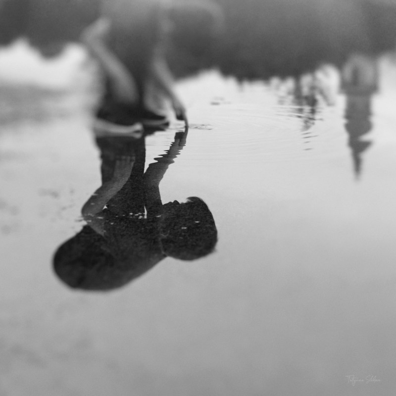 Houston Child Photography; Houston Fine Art Photography; Black and White Child Portrait; Puddle Reflection; Freelensing